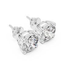 Round brilliant cut diamond stud earring in 14k white gold