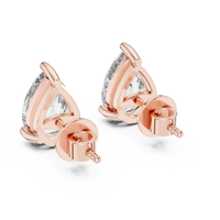 Pear shaped diamond stud earring in 14k rose gold
