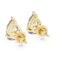 Pear shaped diamond stud earring in 14k yellow gold