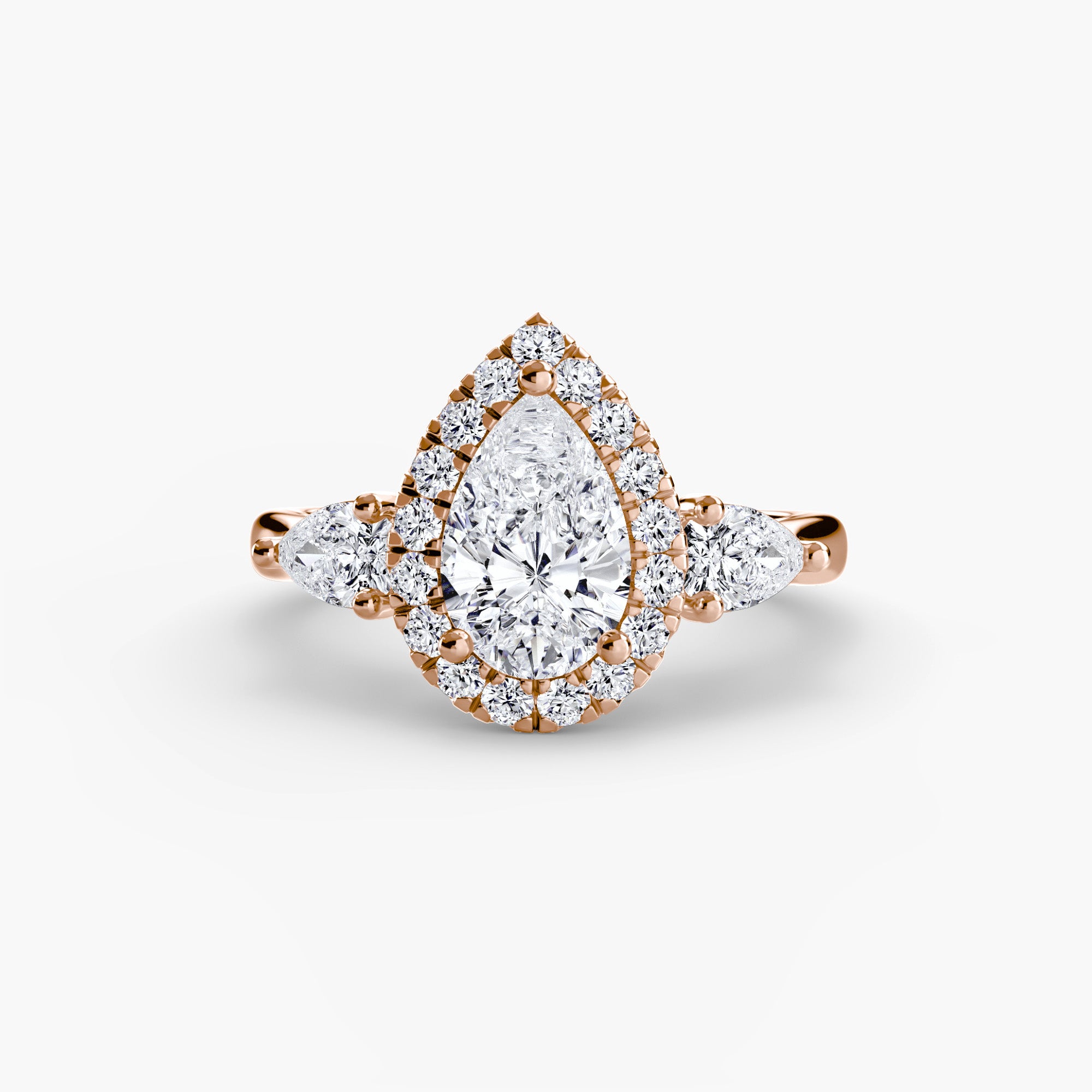 Pear Halo Three Stone Setting