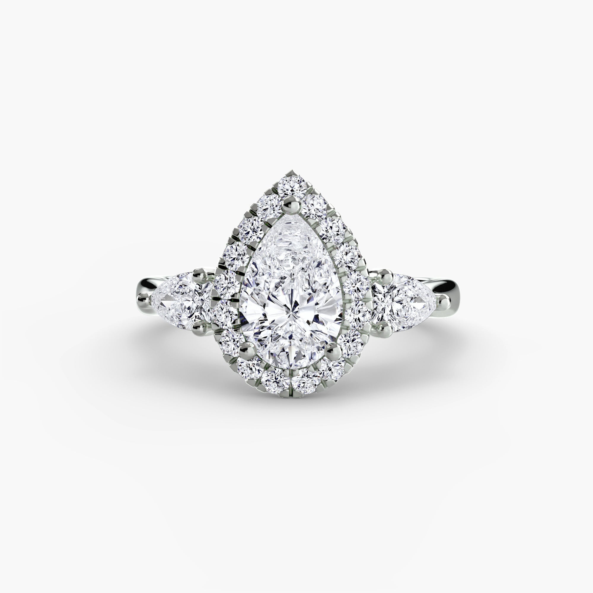 Pear Halo Three Stone Setting