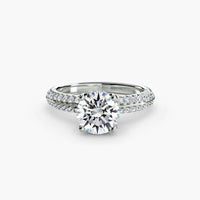 Solitaire with Pavé ring setting in 14k white gold