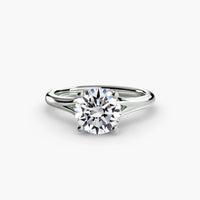 Solitaire ring 4 ring setting in 14k white gold
