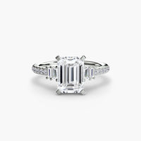 Solitaire with Pavé 4 ring setting in 14k white gold with emerald center stone