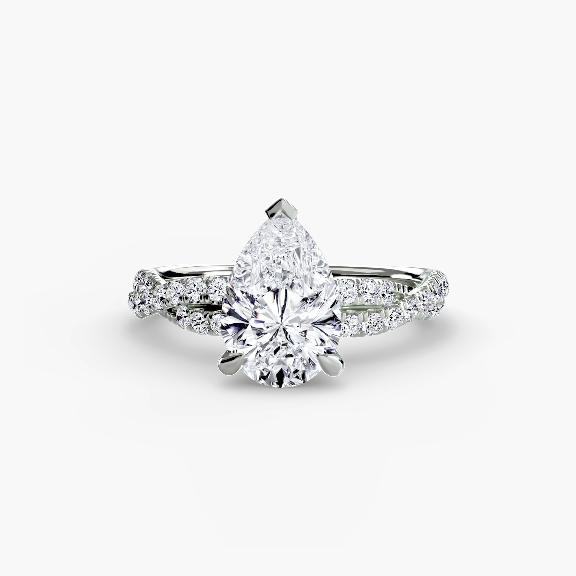 The Twisted Pavé Solitaire ring setting in 14k white gold with pear center stone