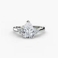 Solitaire with Cluster Shoulders 2 ring setting in 14k white gold with pear center stone