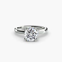 Solitaire ring 5 ring setting in 14k white gold with round center stone